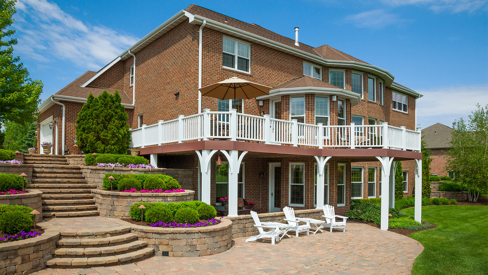 House exterior with deck and masonry